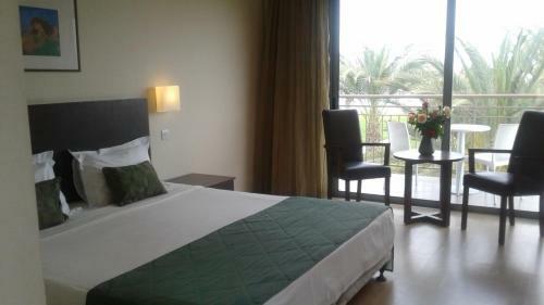 Natura Beach Hotel And Villas