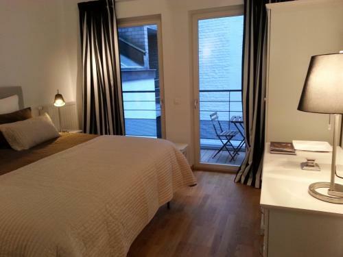 Grand Place The Looks Apartment
