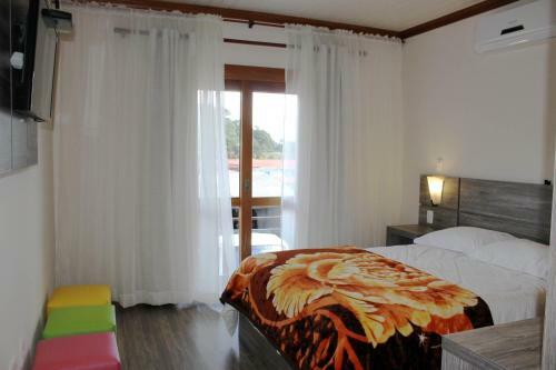 Hostal Residencial Aconchego Do Lago