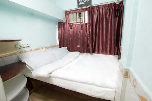 Hostal Happy Land Guesthouse