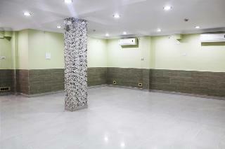 Fabhotel Arya International Elgin Road