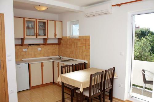 Apartments With A Parking Space Banjol (rab) - 4956