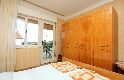 Hostal Apartments With A Parking Space Palit (rab) - 5052