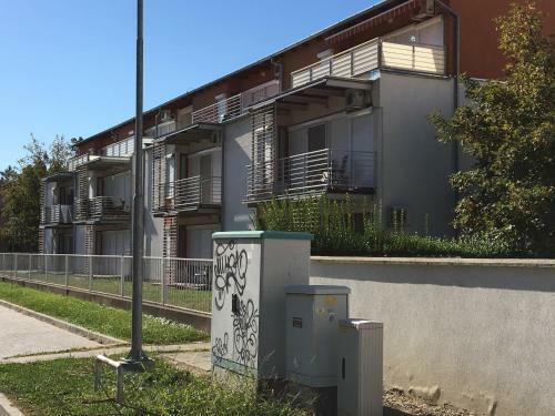 Aranyparton Medenc�s Apartman