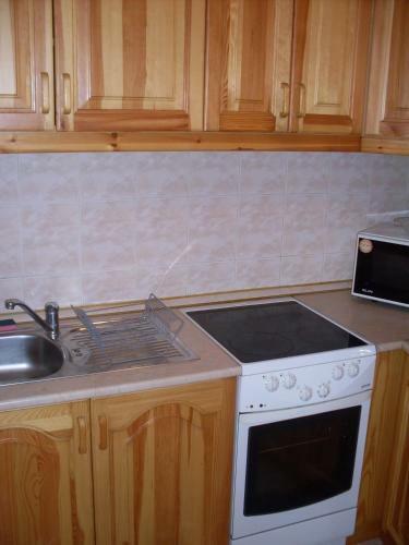 K�roly Apartments
