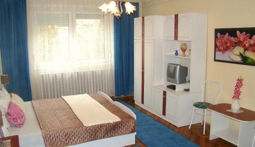 Napf�ny Apartmanh�z
