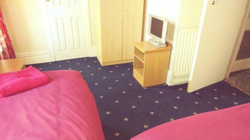 Hostal The Woodley Hotel