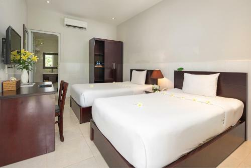 Hotel The Sailing Bay Beach Resort