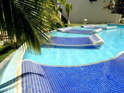 Tropical Gardens Suites And Apartments