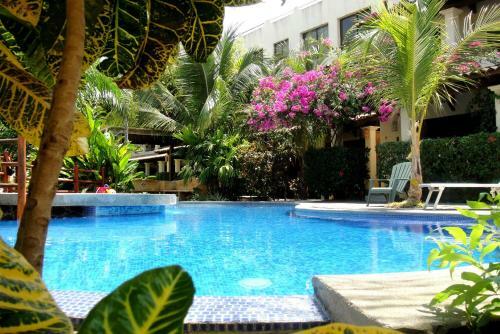 Tropical Gardens Suites And Apartments