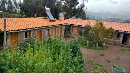 Casa Vivencial Yuraq Qaqa