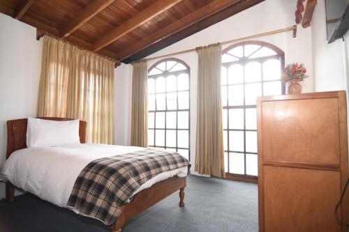 Hotel Centenario Inn