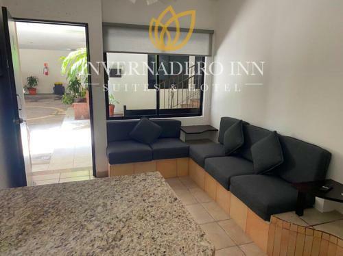 Suites Invernadero Hotel