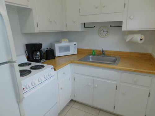 Apartamento The Grove Beach Condominiums
