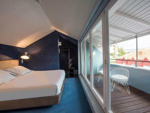 Apartamentos The Arc Carr�s