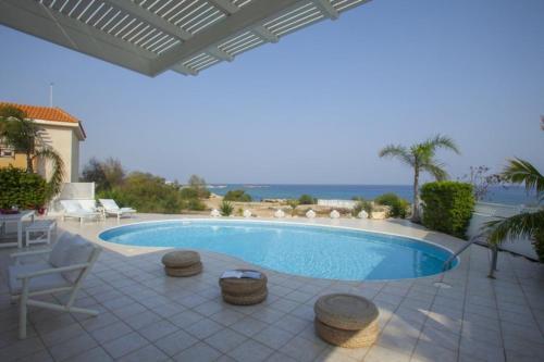 ?picture Renting This Beachfront Villa? Mimosa Seafront Villa