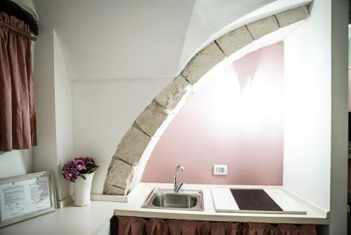Home 5 - Arco Antico