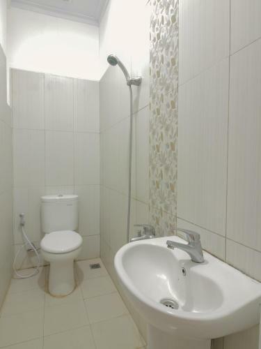 Hostal Oyo 396 Tibrae Residence Syariah