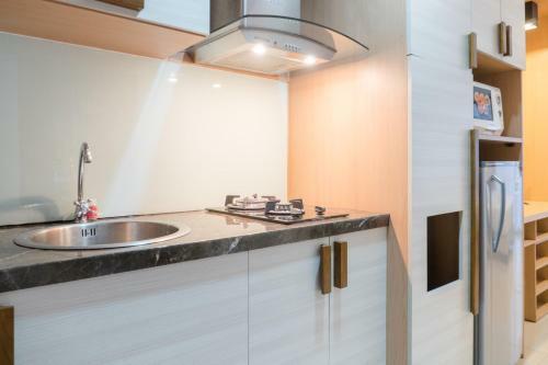 Comfy Studio At Dago Suites Apartment By Travelio