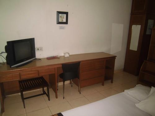 Hostal Rumah Tawa Guesthouse - 1