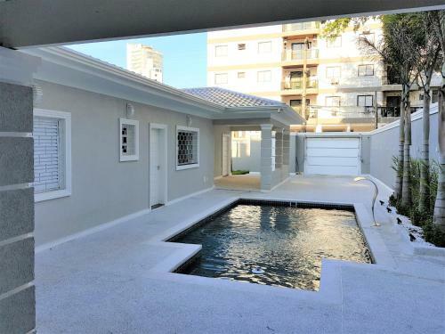 Casa Com Piscina Guaruj� - Tombo