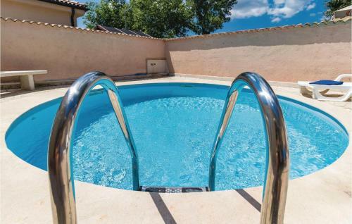 Two-bedroom Holiday Home In Marcana