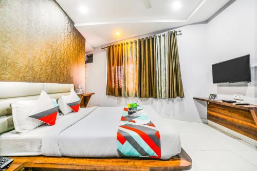 Fabhotel Golden Village