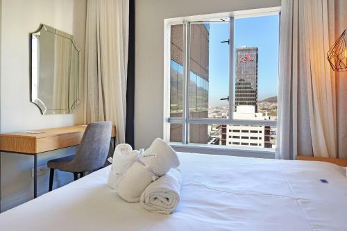 Apartamento Triangle Luxury Suites By Totalstay