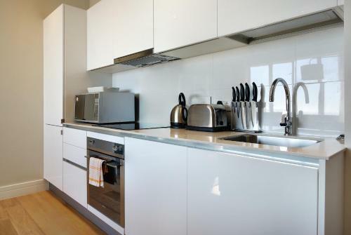 Apartamento Triangle Luxury Suites By Totalstay