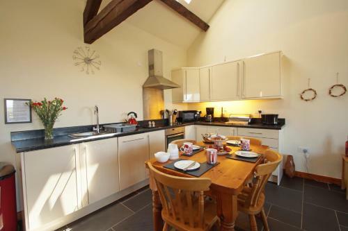 Bythynnod Lleuddad Cottages