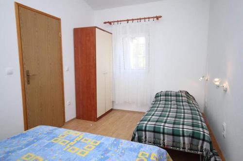 Apartment Metajna 6466d