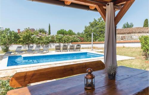 Four-bedroom Holiday Home In Vabriga