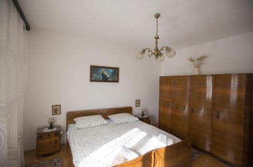 Apartment Postira 12291a