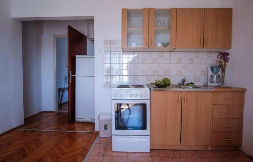 Apartments With A Parking Space Barbat (rab) - 14431