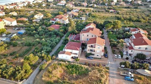 Apartments With A Parking Space Barbat (rab) - 14431