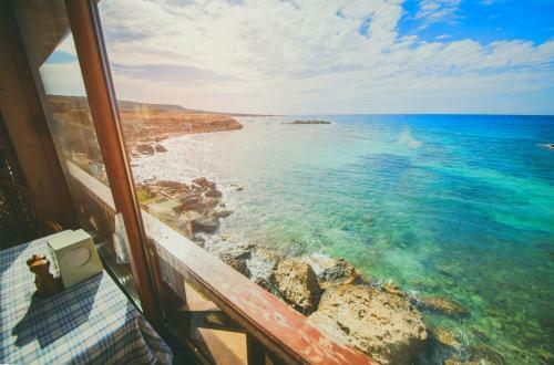 Hostal Oasis Beachfront Guest Rooms And Restaurant