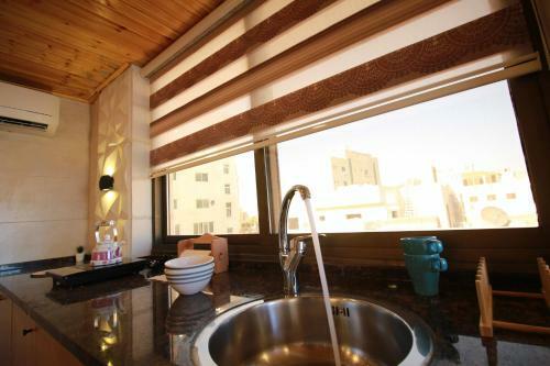 Aqarco Sanar Apartment