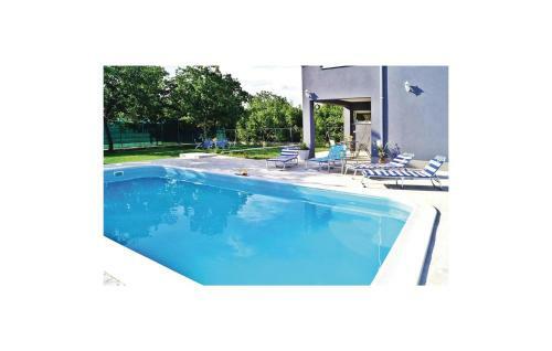 Four-bedroom Holiday Home In Turjaci