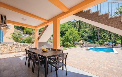 Three-bedroom Holiday Home In Plomin