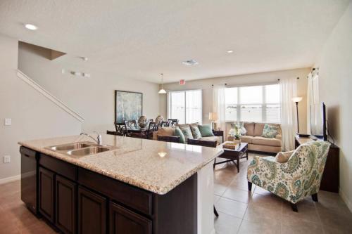 Beautiful 4 Bedroom 3.5 Bath End Unit Town Home Located In Compass Bay