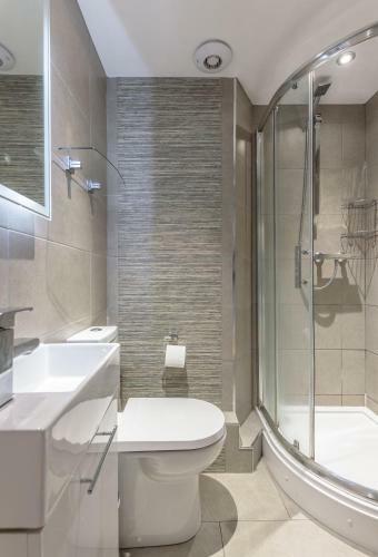 Apartamento The Broughton Mews Residence