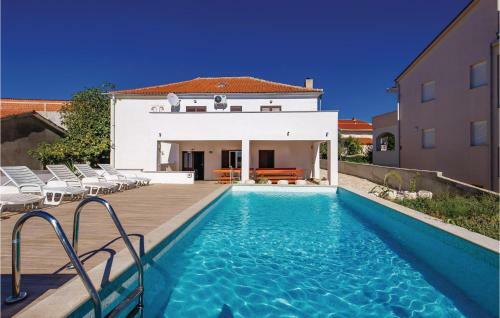 Four-bedroom Holiday Home In Novalja