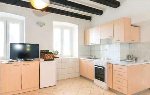 Four-bedroom Holiday Home In Novalja