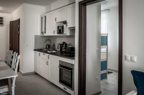 Aranymandula Apartmanok