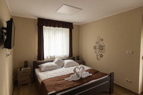 Cuha-gy�ngye Apartmanh�z