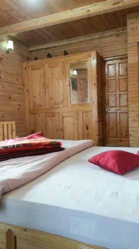 Ishan Log Huts Bahu