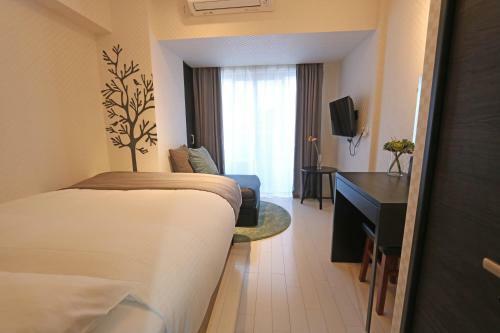 Aparthotel Petit Grande Homes