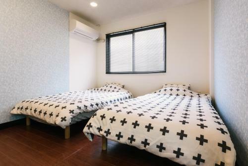 Hostal Guest House Yasuragi Hakataekimae
