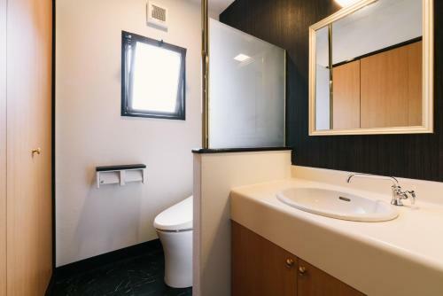 Hostal Guest House Yasuragi Hakataekimae