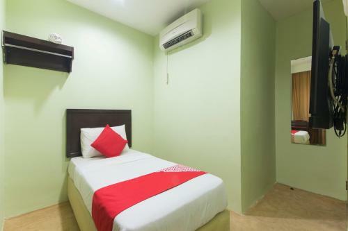 Oyo 1102 Amani Hotel